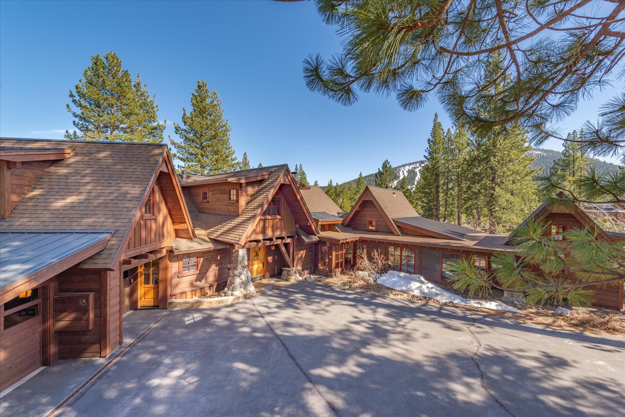 12416 Tom Dolley Truckee, CA 96161 - Photo 2 of 21 a view of a large house with a yard