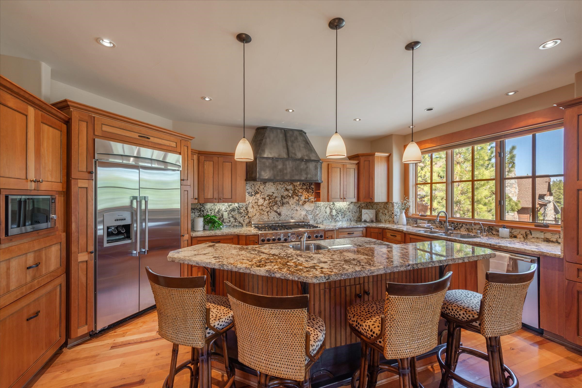 12416 Tom Dolley Truckee, CA 96161 - Photo 5 of 21 a view of a dining table chairs and chandelier