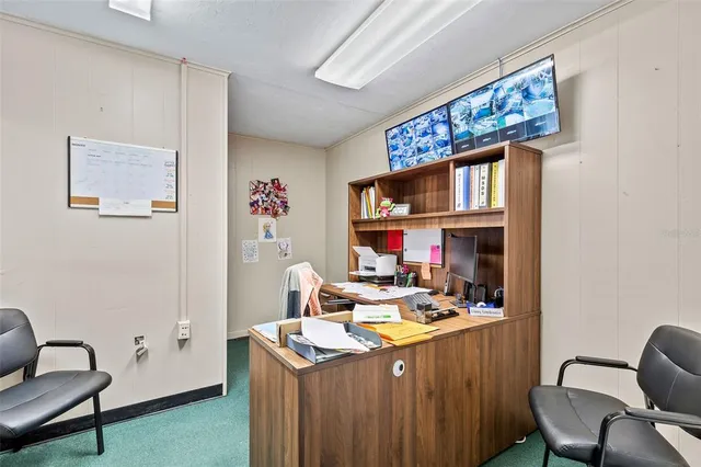 a playing room with lots of furniture and toys
