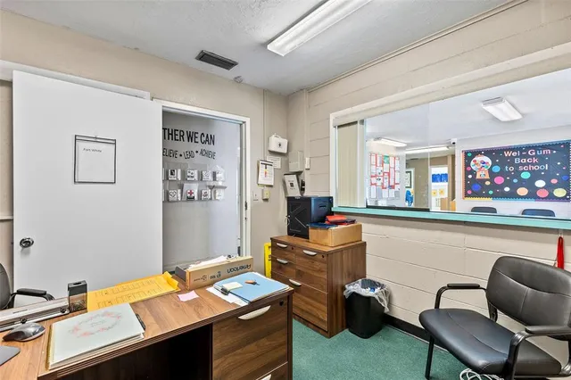 a view of a dining room with furniture