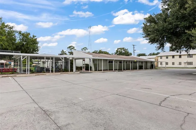 a view of a street with cars