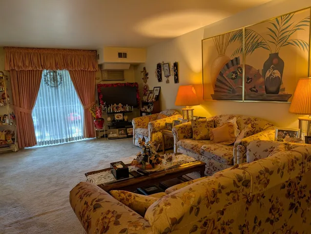 a bed room with a bed and a chair