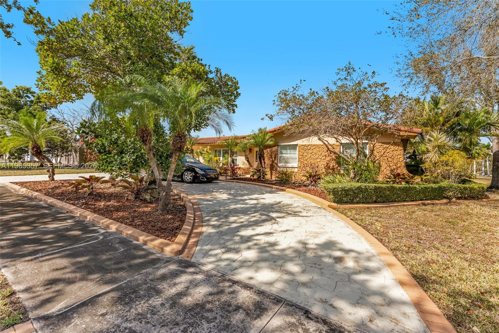 a view of yard with large trees