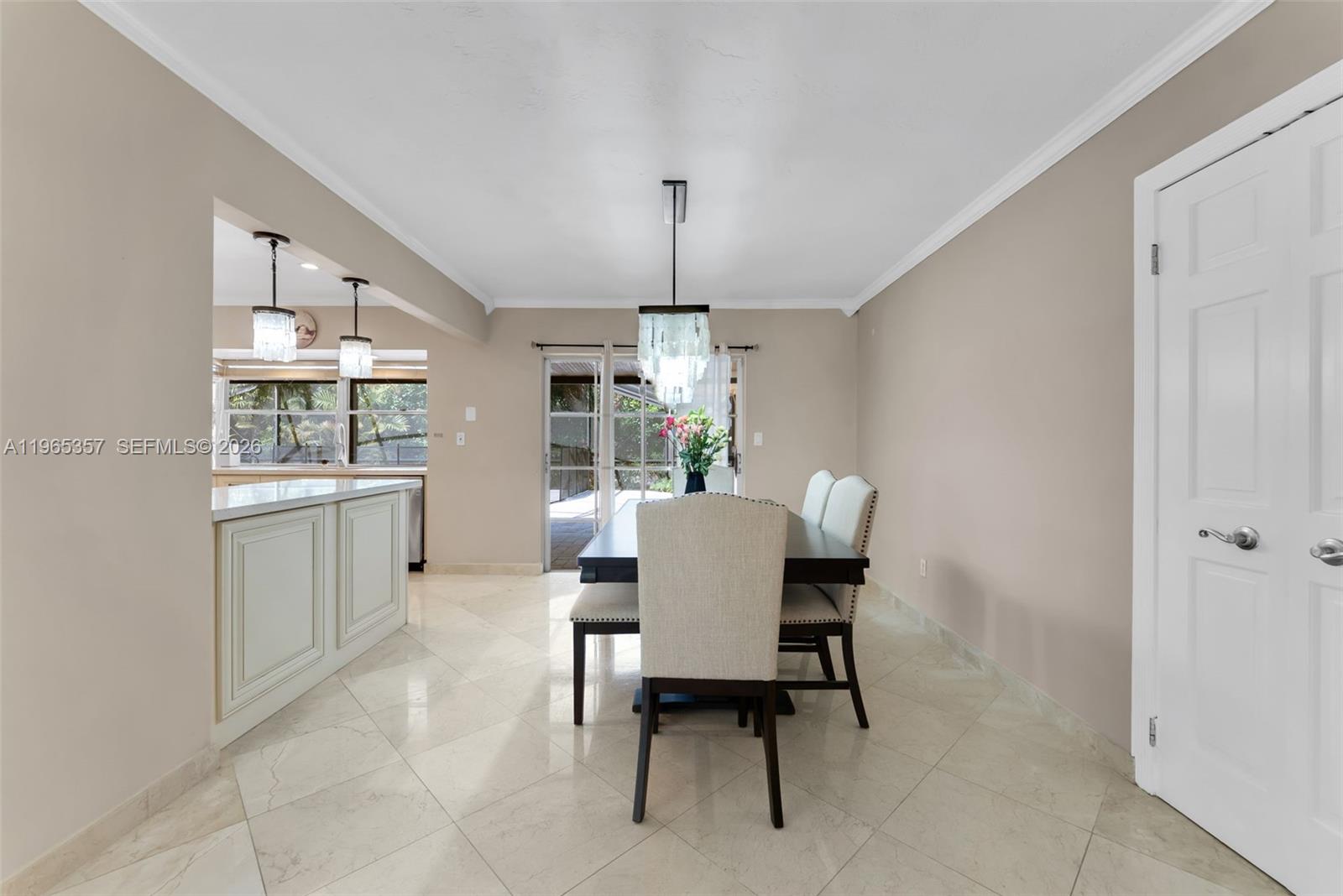 11201 Southwest 136th Street Miami, FL 33176 - Photo 16 of 40 a dining room with furniture and window