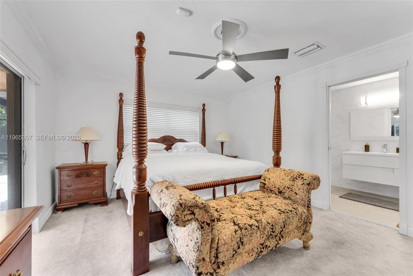 11201 Southwest 136th Street Miami, FL 33176 - Photo 24 of 40 a bedroom with bed and window