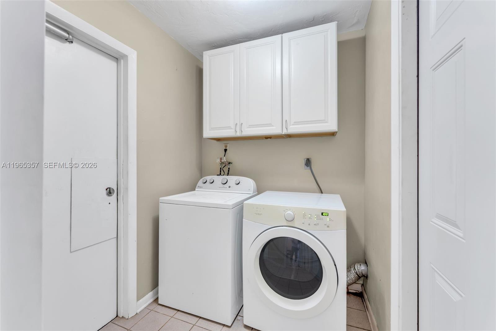 11201 Southwest 136th Street Miami, FL 33176 - Photo 29 of 40 a utility room with dryer and washer