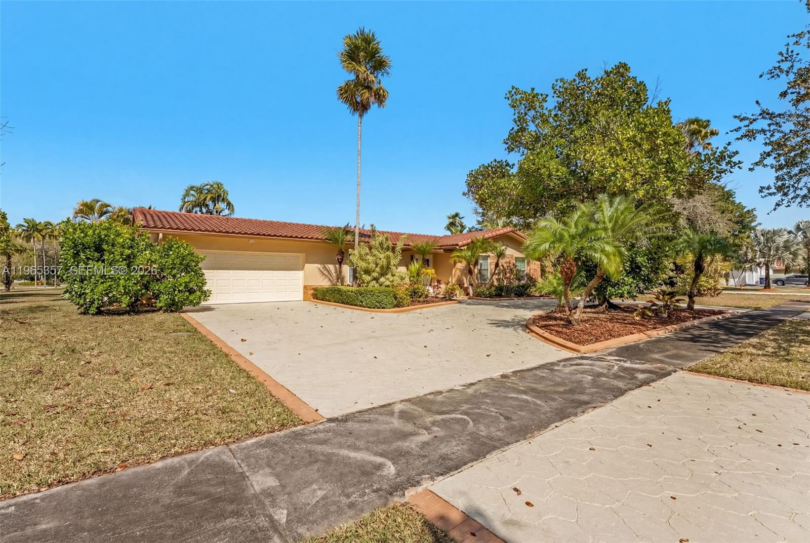 11201 Southwest 136th Street Miami, FL 33176 - Photo 3 of 40 a view of a swimming pool with a yard