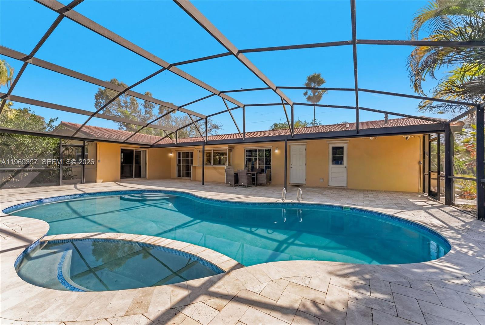 11201 Southwest 136th Street Miami, FL 33176 - Photo 32 of 40 a view of a house with swimming pool