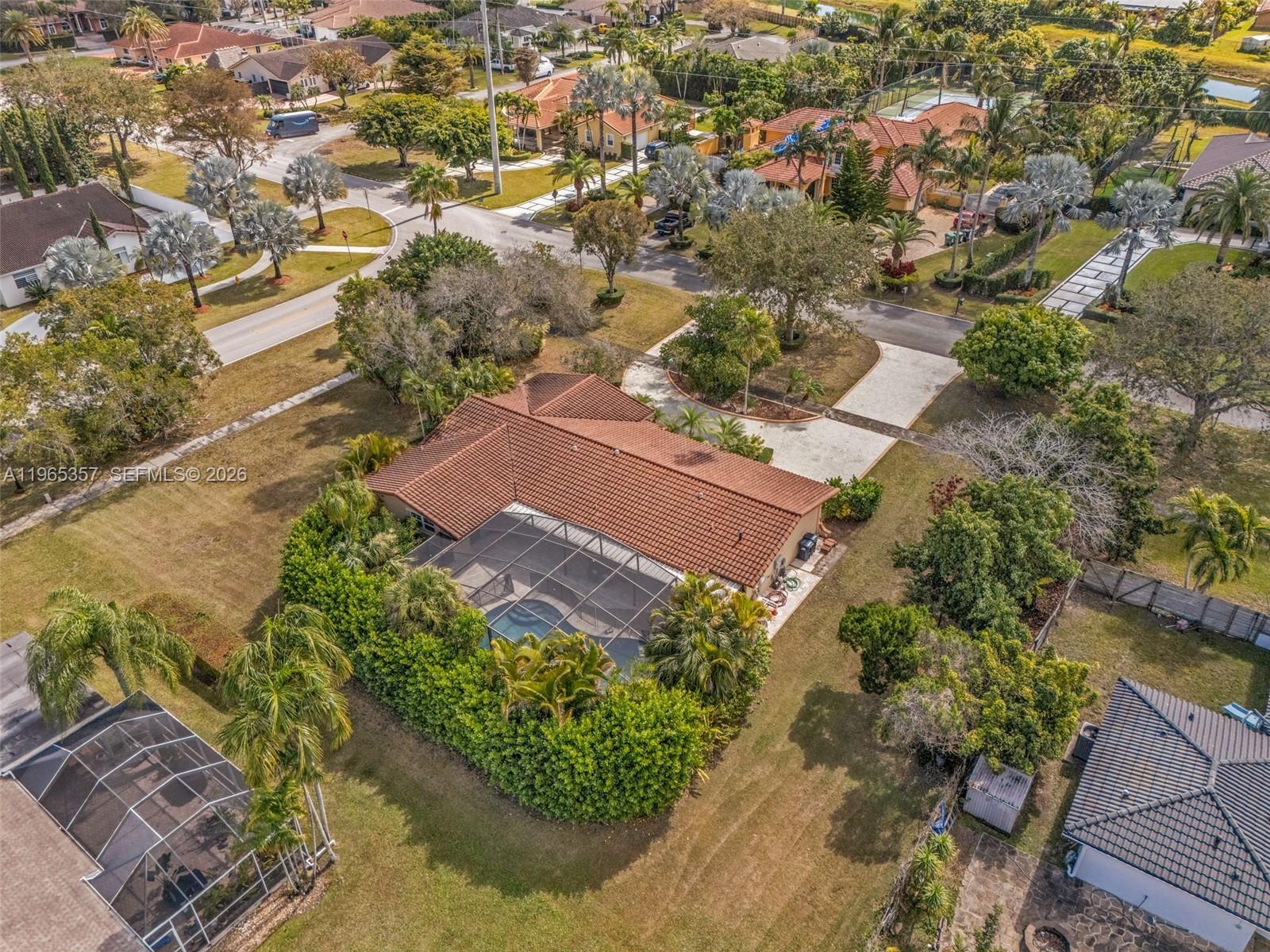 11201 Southwest 136th Street Miami, FL 33176 - Photo 38 of 40 an aerial view of residential houses with outdoor space