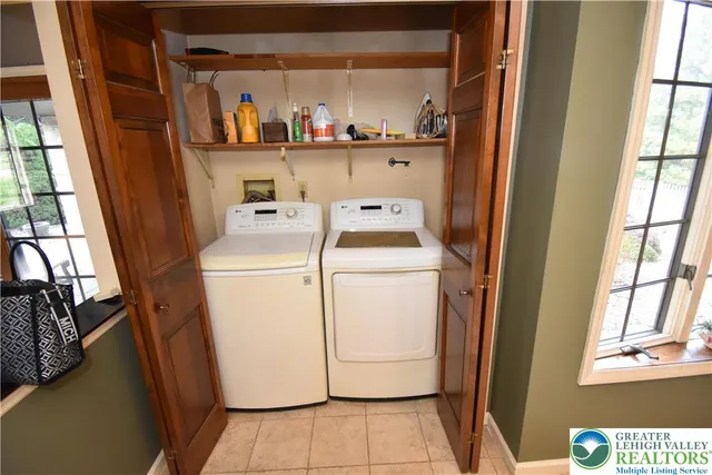 a utility room with dryer and washer