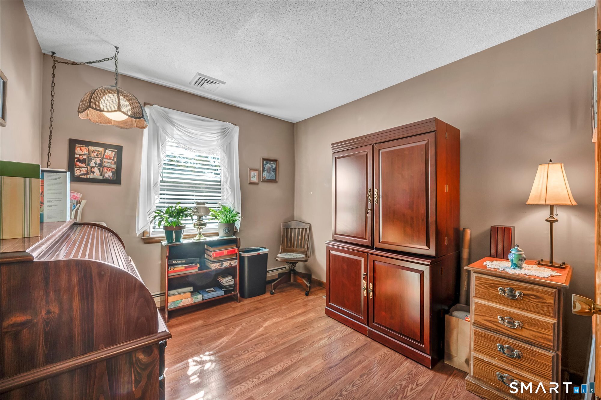 65 R Hanover Street Wallingford, CT 06492 - Photo 23 of 37 Third bedroom has laminate flooring.