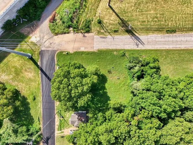 a view of a garden with a fountain