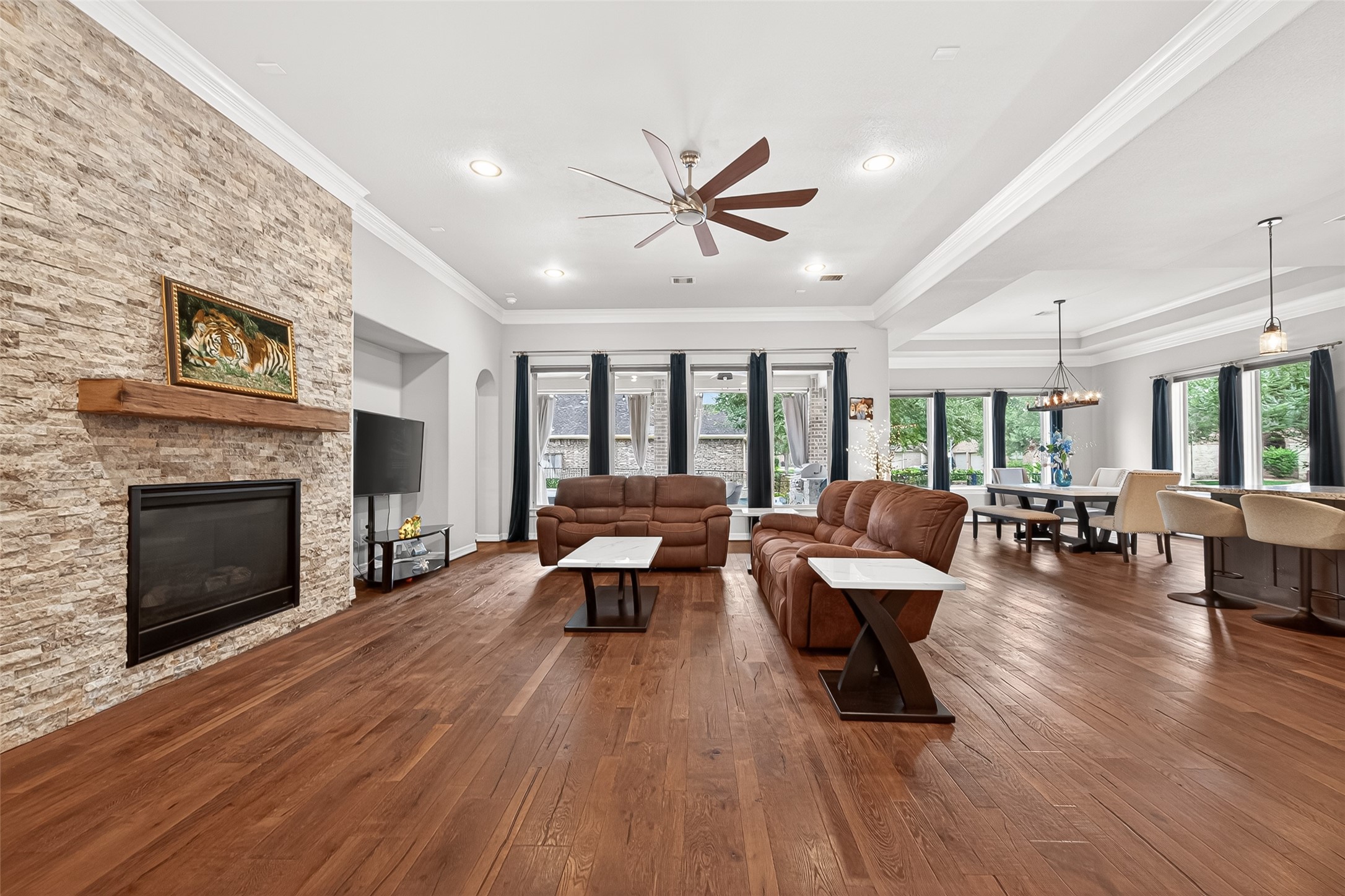 32607 Wingfoot Circle Fulshear, TX 77441 - Photo 8 of 39 A wall of windows greet you as you enter this beautiful space.