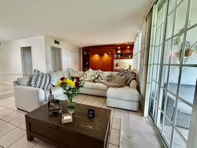 a living room with furniture and a couch