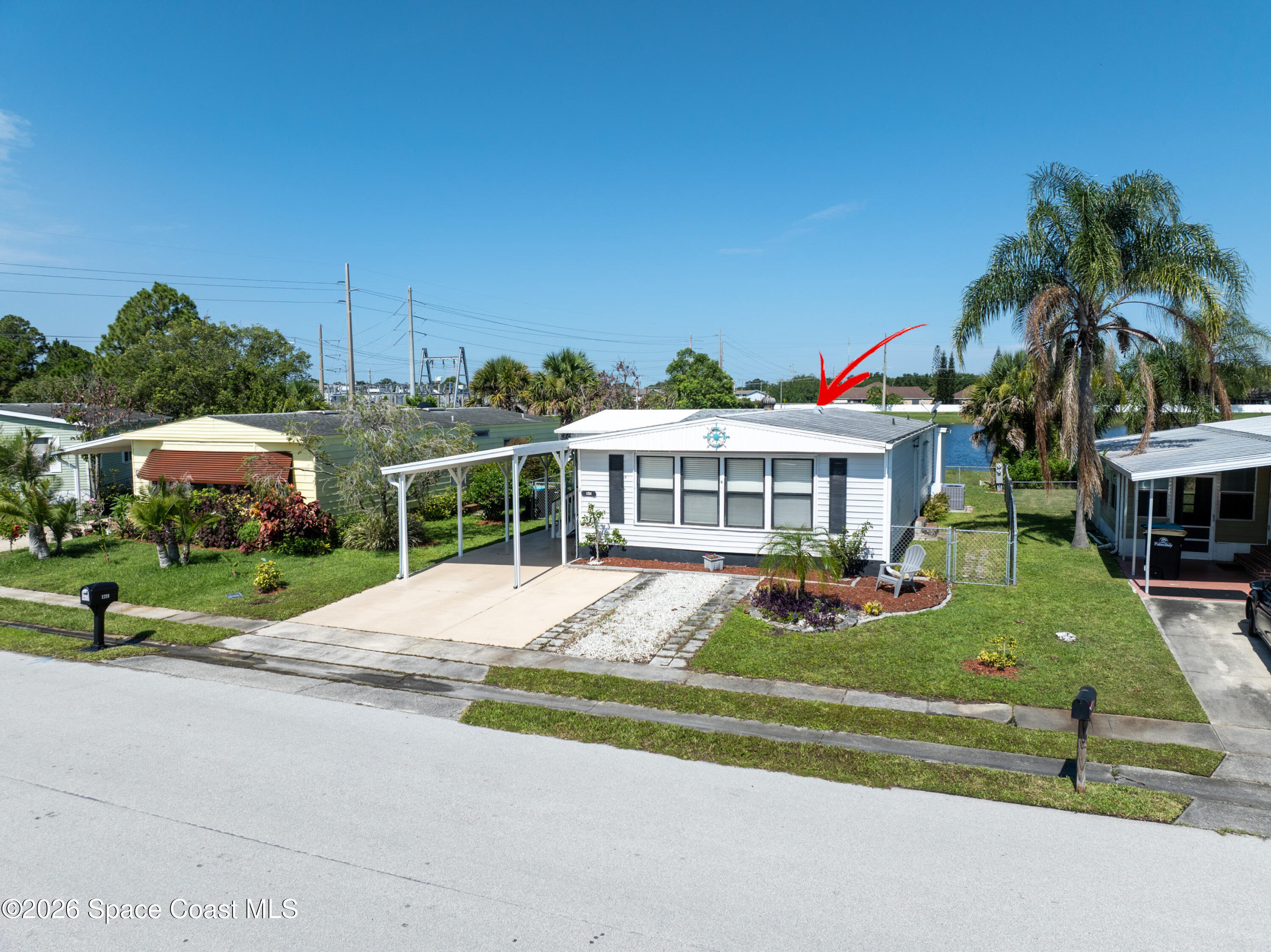 1724 Mango Street Northeast Palm Bay, FL 32905 - Photo 1 of 48 DJI_0497 copy