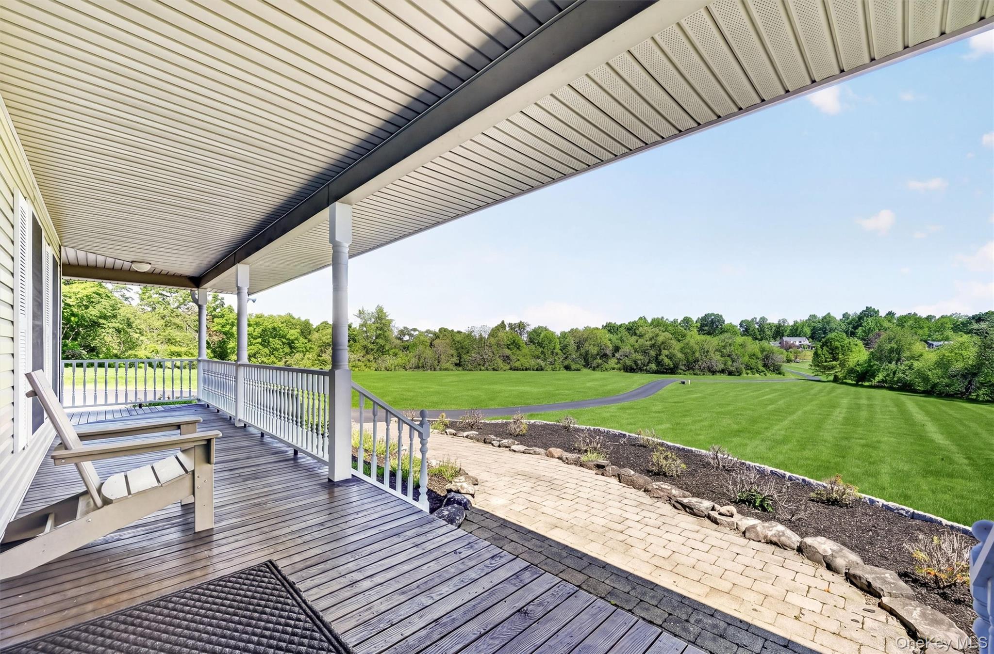 954 Ridgebury Road New Hampton, NY 10958 - Photo 6 of 45 The porch offers a quiet place to sit, take in the view, and enjoy the peaceful rhythm of the property.