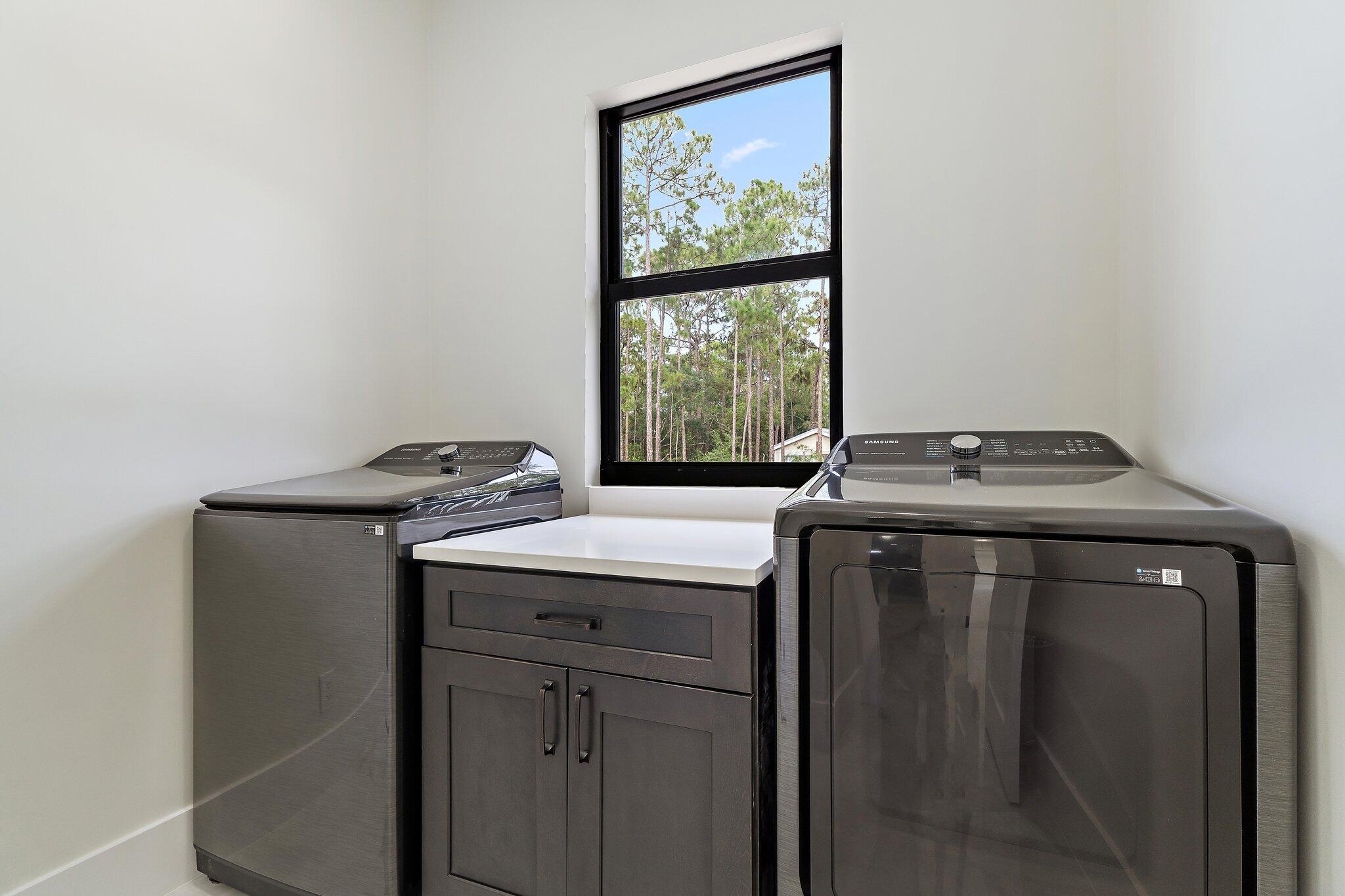 12850 152nd Street North Jupiter, FL 33478 - Photo 101 of 117 a utility room with dryer and washer