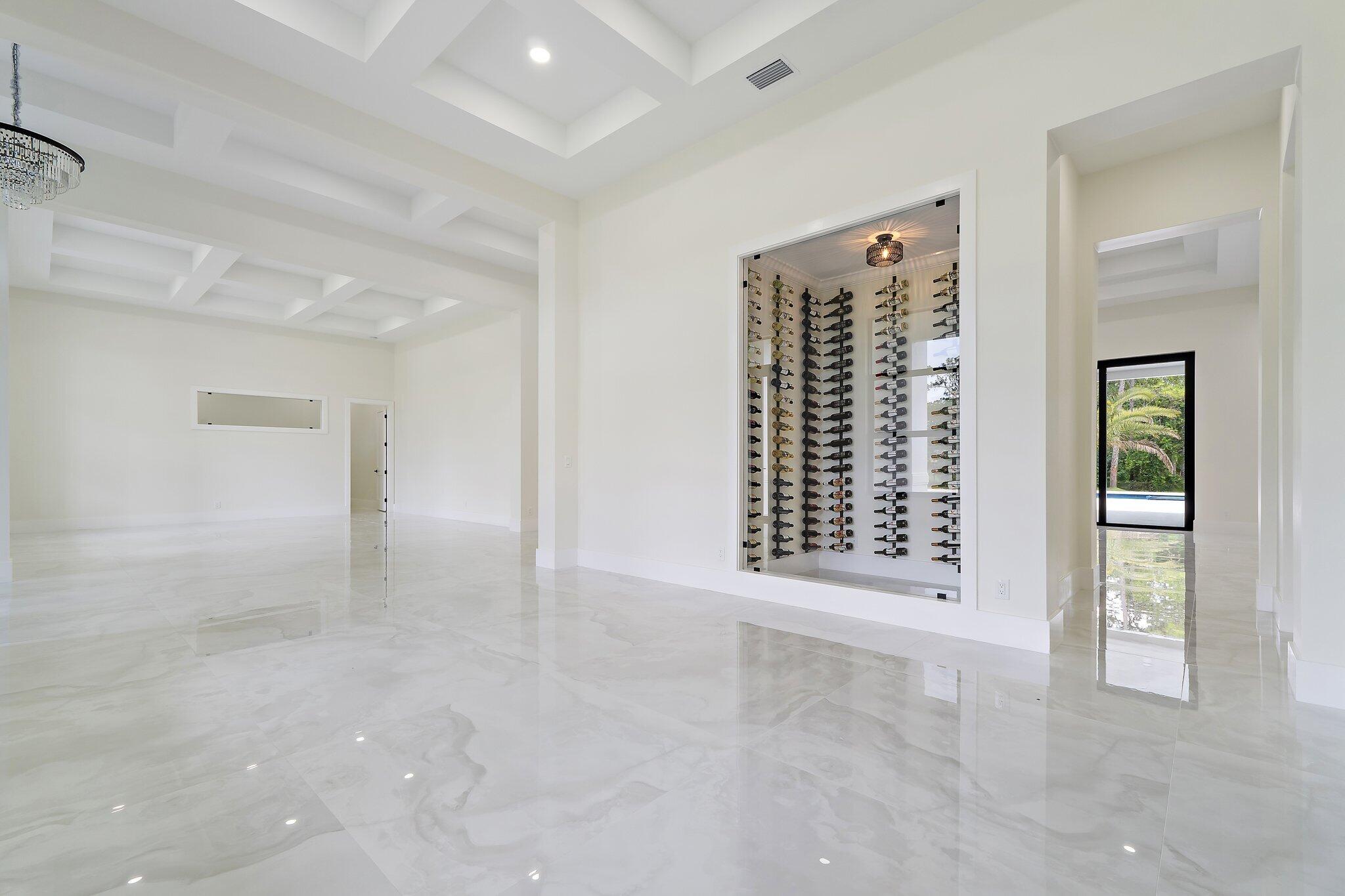 12850 152nd Street North Jupiter, FL 33478 - Photo 22 of 117 a view of an empty room with a window