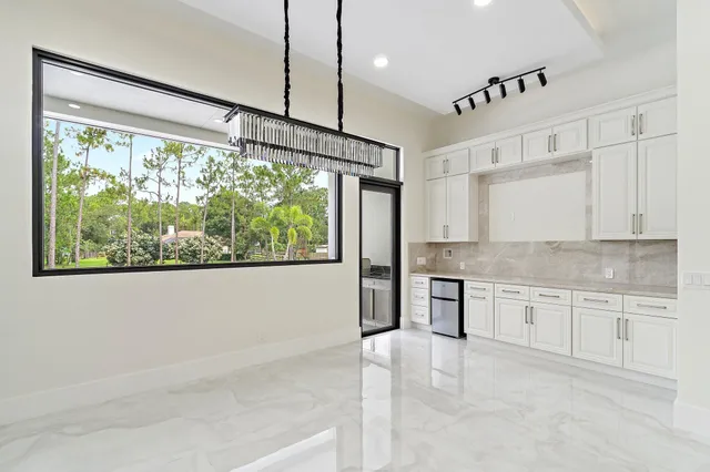 a view of a house with entertaining space