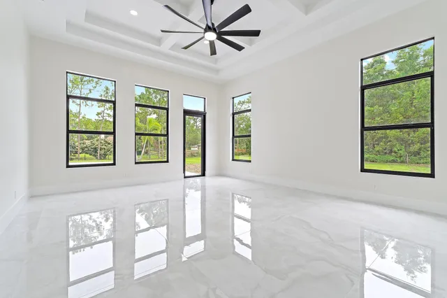 a bathroom with a toilet sink vanity and shower
