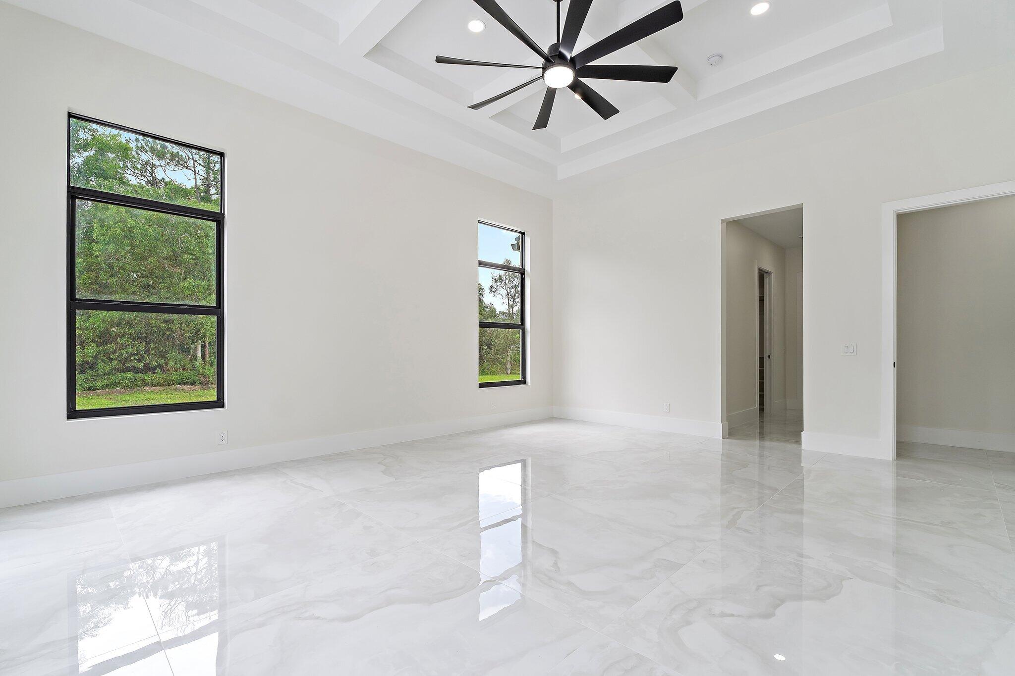 12850 152nd Street North Jupiter, FL 33478 - Photo 50 of 117 a view of an empty room with a window