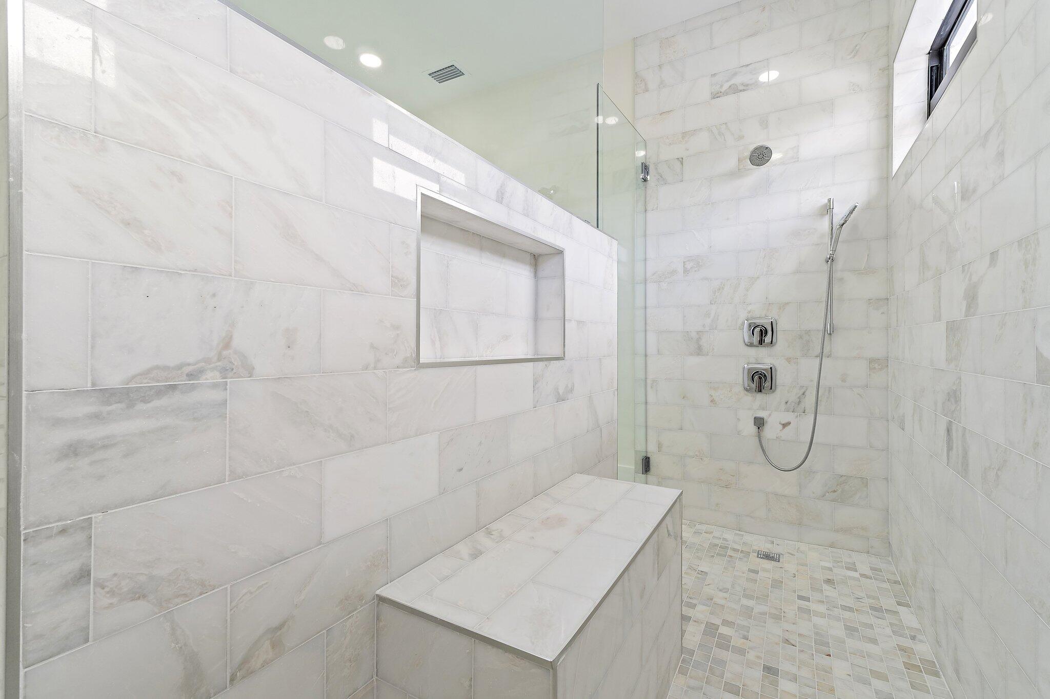 12850 152nd Street North Jupiter, FL 33478 - Photo 56 of 117 a bathroom with a granite countertop sink a toilet and shower