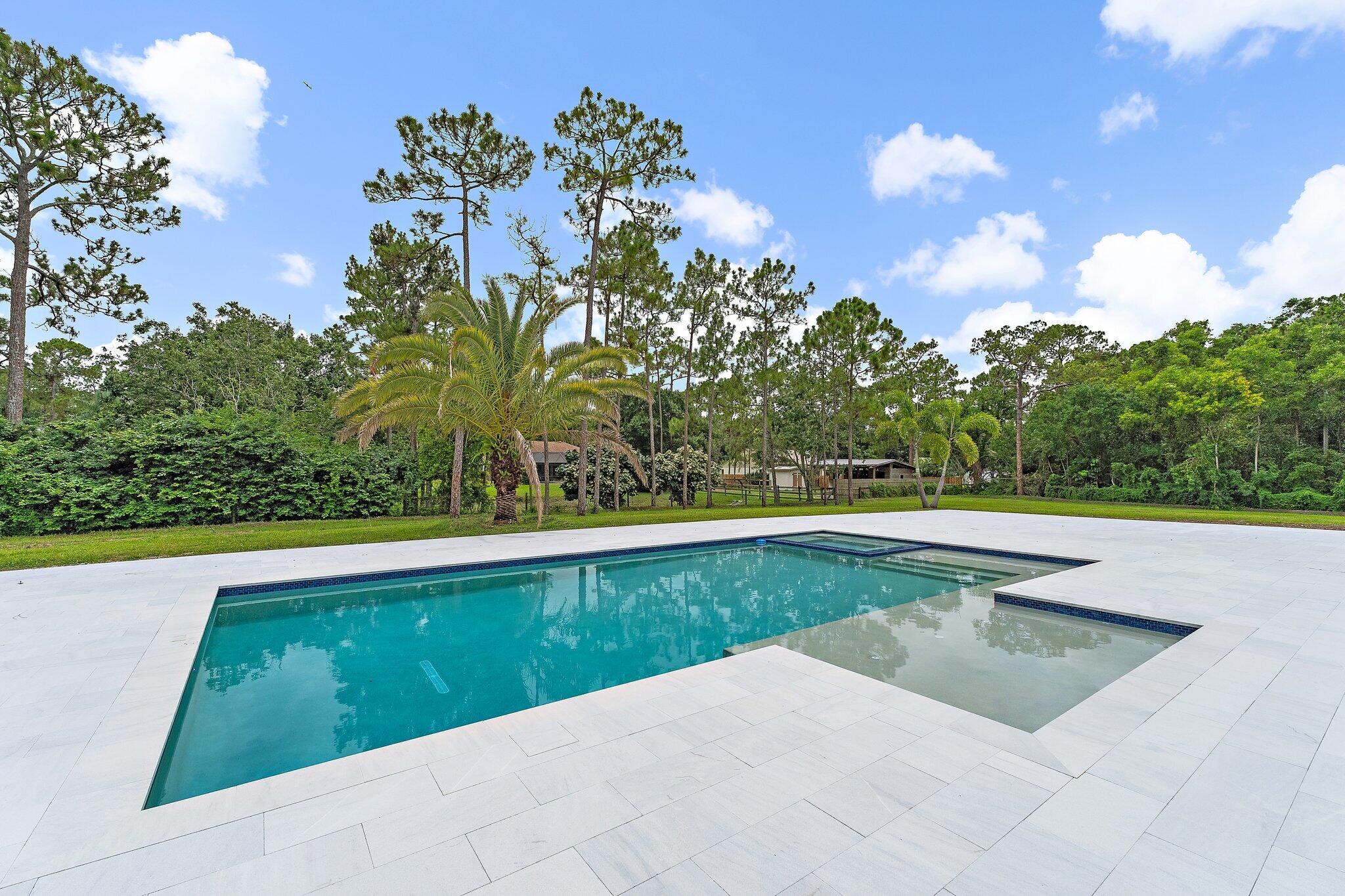 12850 152nd Street North Jupiter, FL 33478 - Photo 82 of 117 a view of swimming pool from a balcony