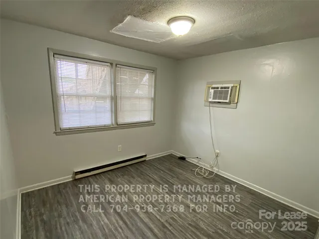 a room with a table and a window