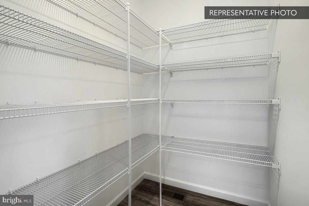 Emily Plan At The Seasons Dover, PA 17315 - Photo 16 of 27 a view of an empty walk in closet