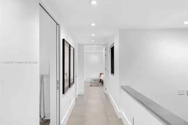 a bathroom with a sink and a large mirror