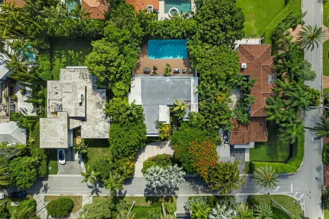 an aerial view of a house with a garden