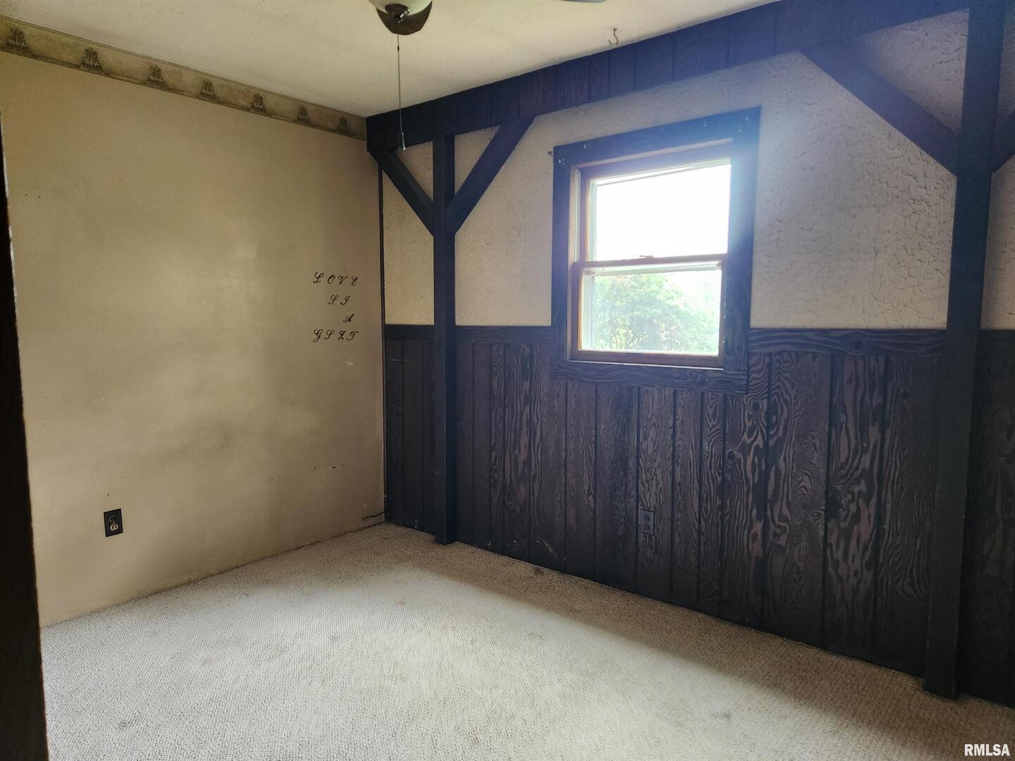 3547 Highway 148 Waltonville, IL 62894 - Photo 8 of 29 a view of an empty room with a window