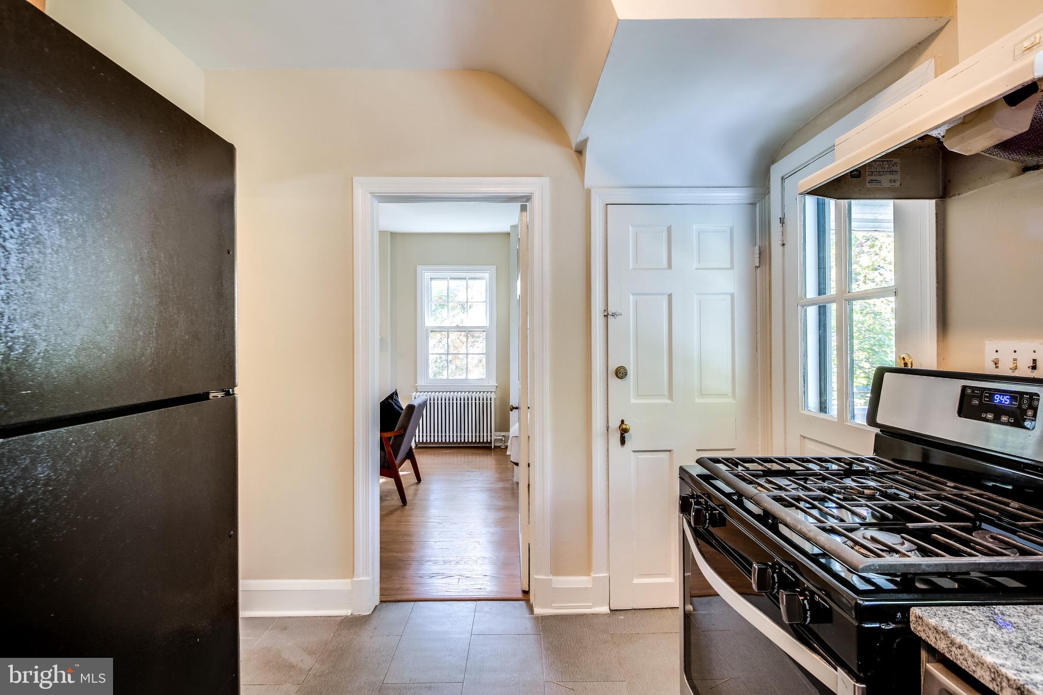 6926 Montgomery Road Elkridge, MD 21075 - Photo 14 of 30 Kitchen Opens to Dining Room & Rear Deck