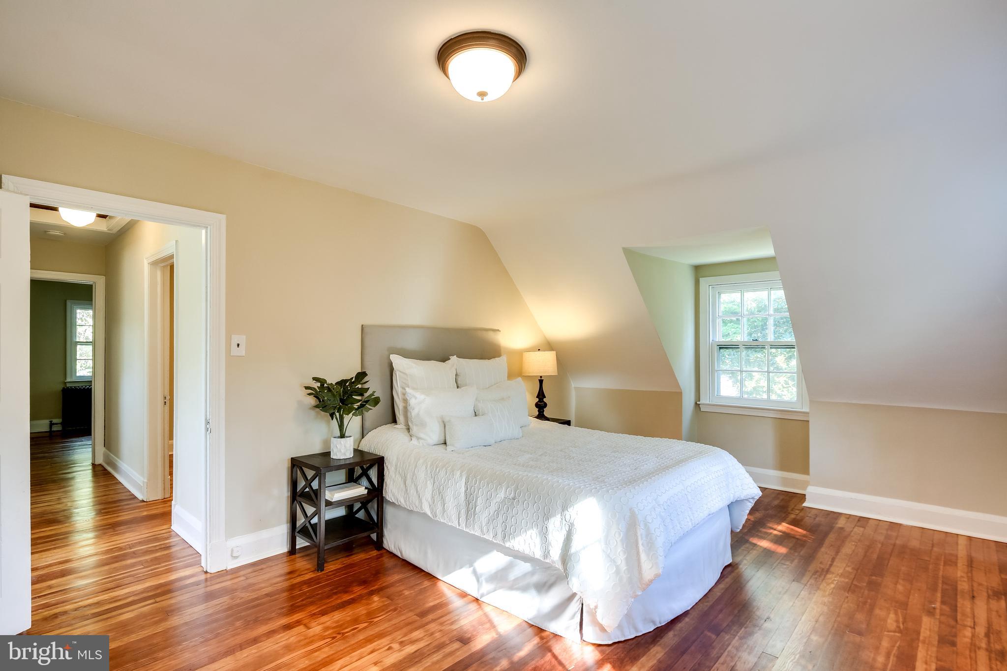 Bedroom w/ Vaulted Ceilings & Dormers