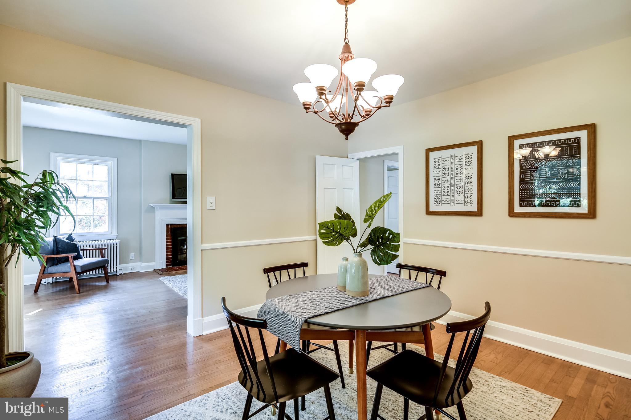 6926 Montgomery Road Elkridge, MD 21075 - Photo 8 of 30 Dining Room w/ Hardwood Floors & Chair Rail