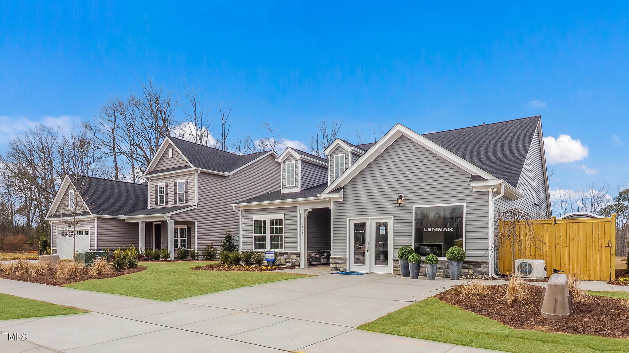 448 Ravensworth Drive Garner, NC 27529 - Photo 1 of 27 a front view of a house with garden and patio