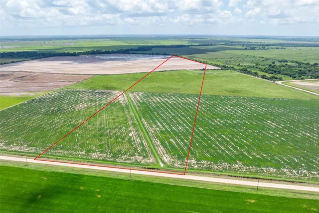 a view of a golf course with a lake