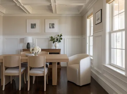 a dining room with furniture and window