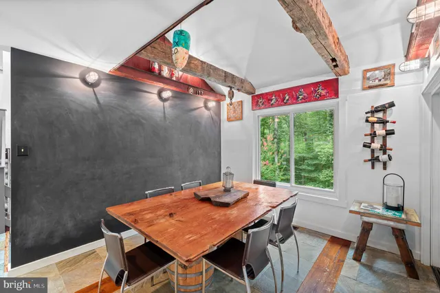 a view of a table and chairs in a patio