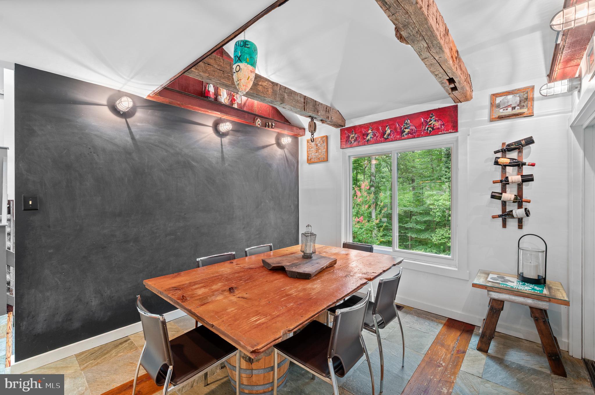 41 Lyons Run Road Glenmoore, PA 19343 - Photo 15 of 42 a view of a table and chairs in a patio