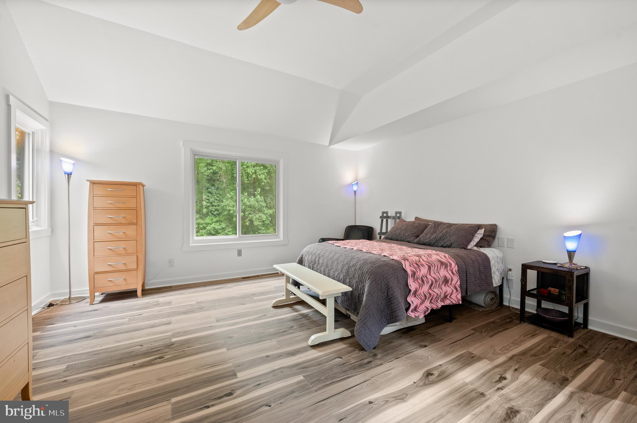41 Lyons Run Road Glenmoore, PA 19343 - Photo 19 of 42 a spacious bedroom with a bed a window and dresser