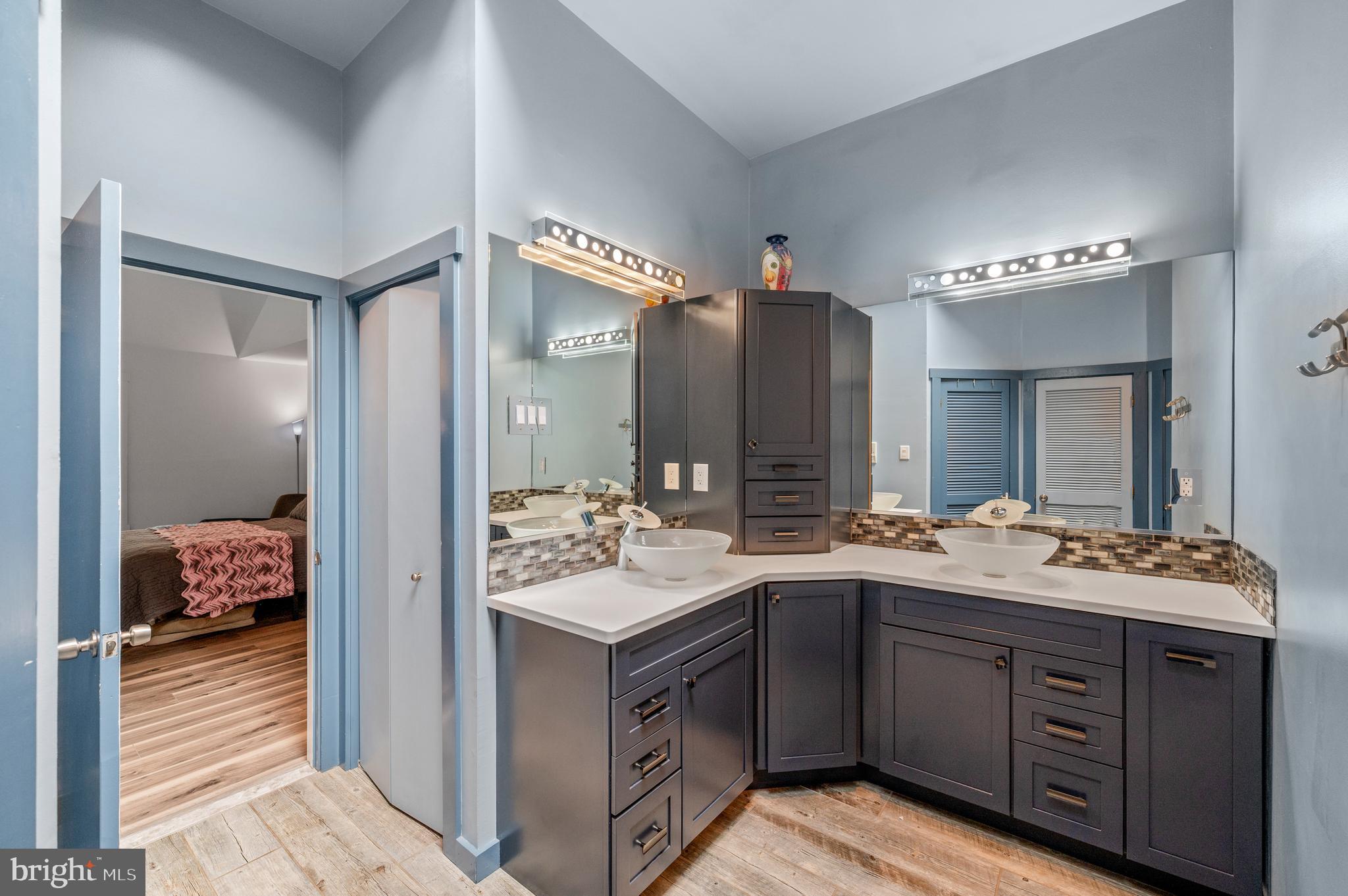 41 Lyons Run Road Glenmoore, PA 19343 - Photo 21 of 42 a spacious bathroom with a sink double vanity and a mirror