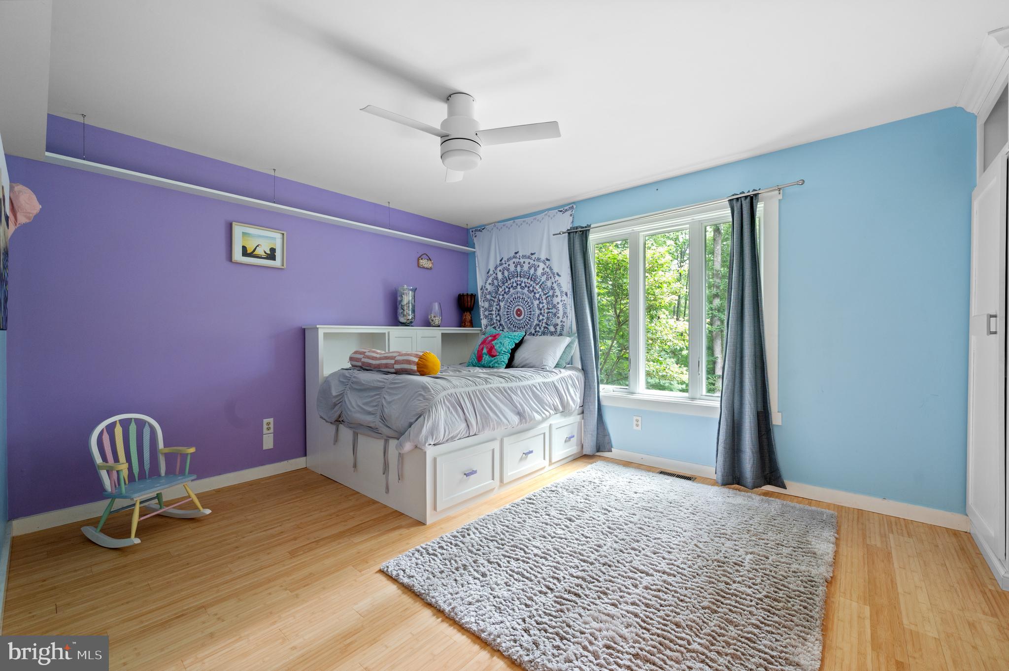 41 Lyons Run Road Glenmoore, PA 19343 - Photo 26 of 42 a bedroom with a bed and wooden floor