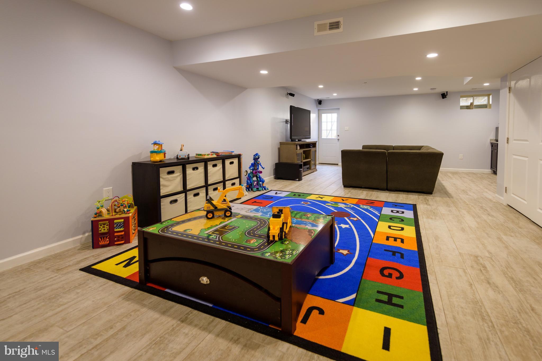 8104 Ridgely Loop Severn, MD 21144 - Photo 23 of 30 Lower Level Family/Recreation Room
