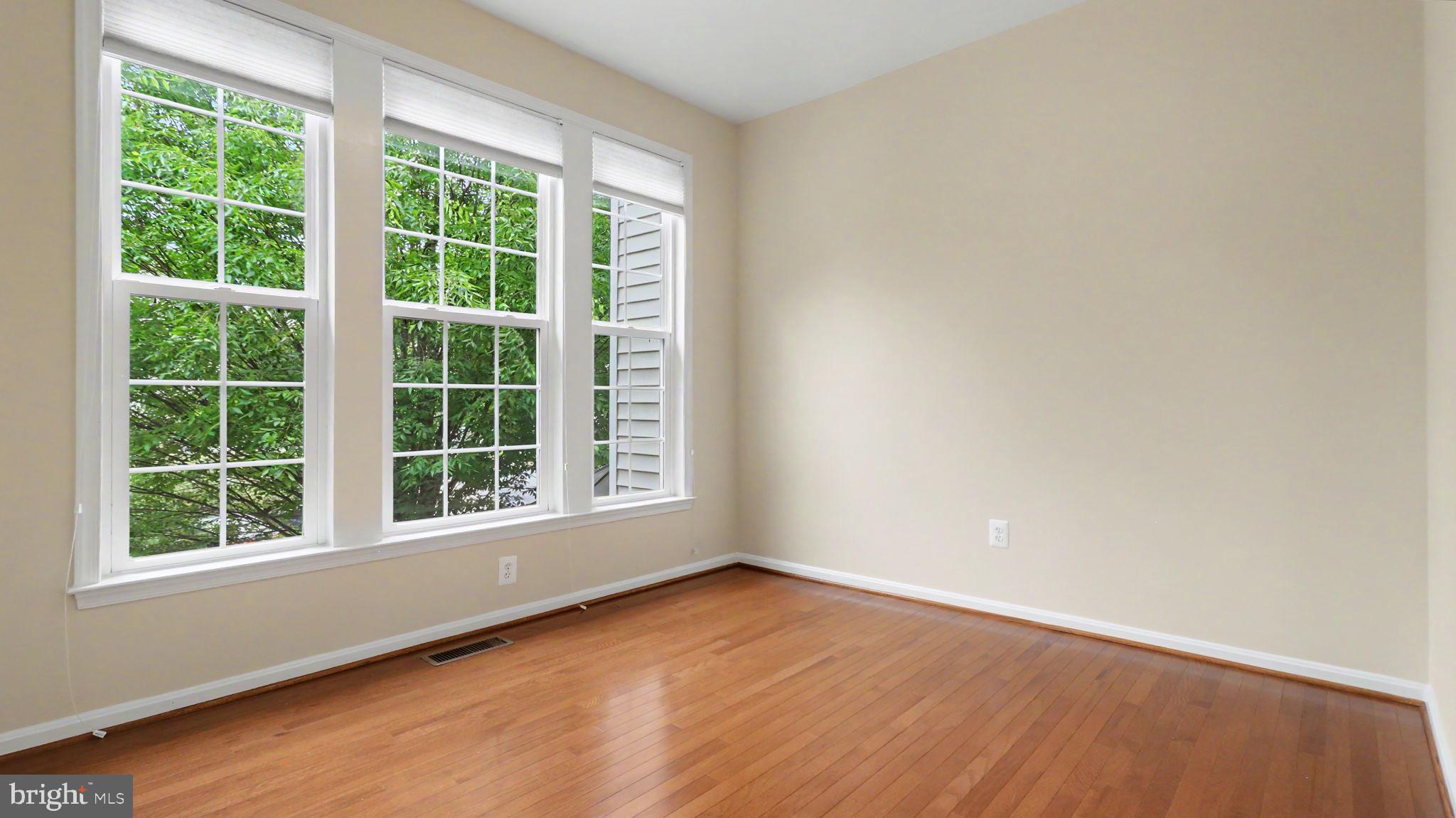42371 Trellis Square Brambleton, VA 20148 - Photo 19 of 70 Bright and airy room with large windows.