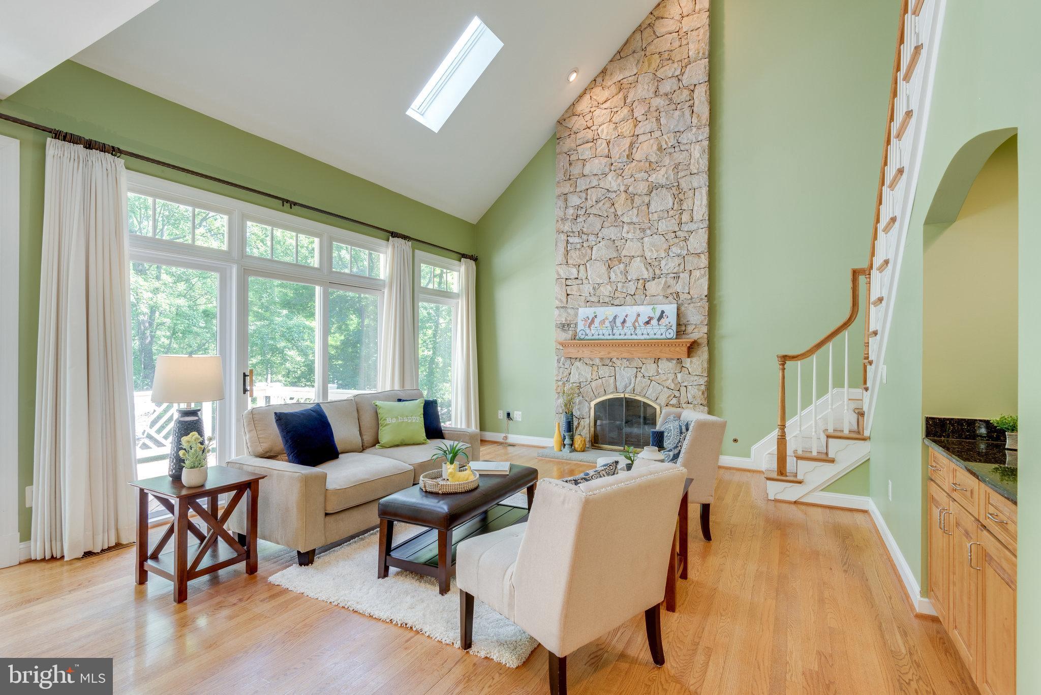 12104 North Walnut Branch Road Reston, VA 20194 - Photo 24 of 70 Family room - wall of windows and two skylights