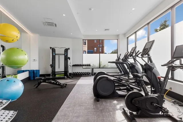 a work room with furniture and a chair