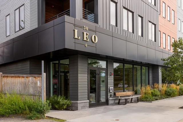 a living room with furniture and window