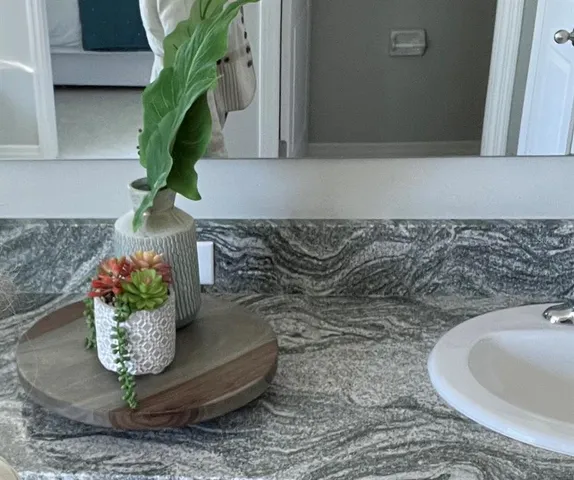 a vase of flowers sitting on a table