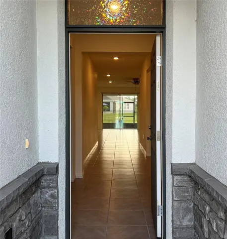 a view of swimming pool with outdoor seating and deck